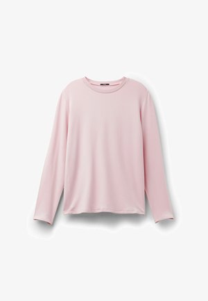 Pink long-sleeve shirt made of soft fabric, featuring a round neckline and relaxed fit, with no patterns or accents.