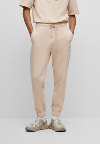 Pantaloni sportivi - light beige
