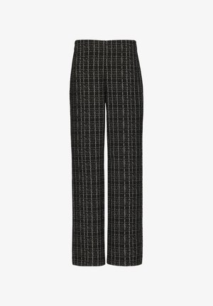 Pantaloni a gamba larga in bianco e nero con una trama tessile e un design a griglia. La vita è piatta senza hardware visibile.