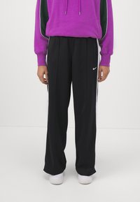 Nike Sportswear PANT - Tracksuit bottoms - black/white