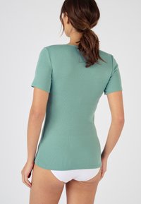 Damart FINITION  - Camiseta estampada - vert