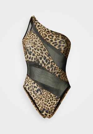 Maillot de bain asymétrique beige avec un motif léopard, présentant des panneaux en mesh noir transparent et une coupe ajustée.