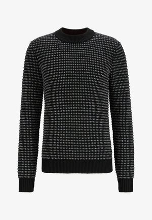 Maglione nero girocollo con motivo a maglia grigia a pois testurizzata, polsini, scollo e orlo a coste.