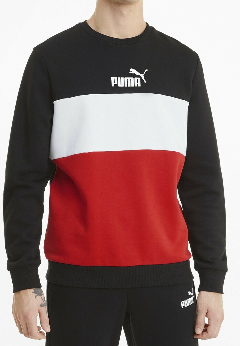 Pullover girocollo nero, bianco e rosso con audaci blocchi di colore orizzontali e logo Puma sul petto. Tessuto morbido e vestibilità rilassata.