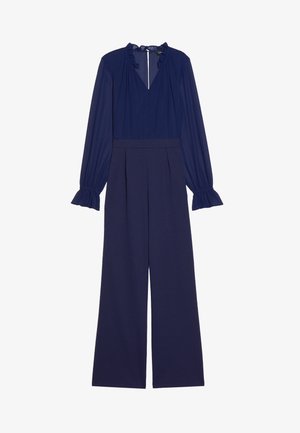 Navy jumpsuit with a ruffled neckline and long, puffed sleeves. Features a fitted bodice and wide-leg trousers with pleated detail.