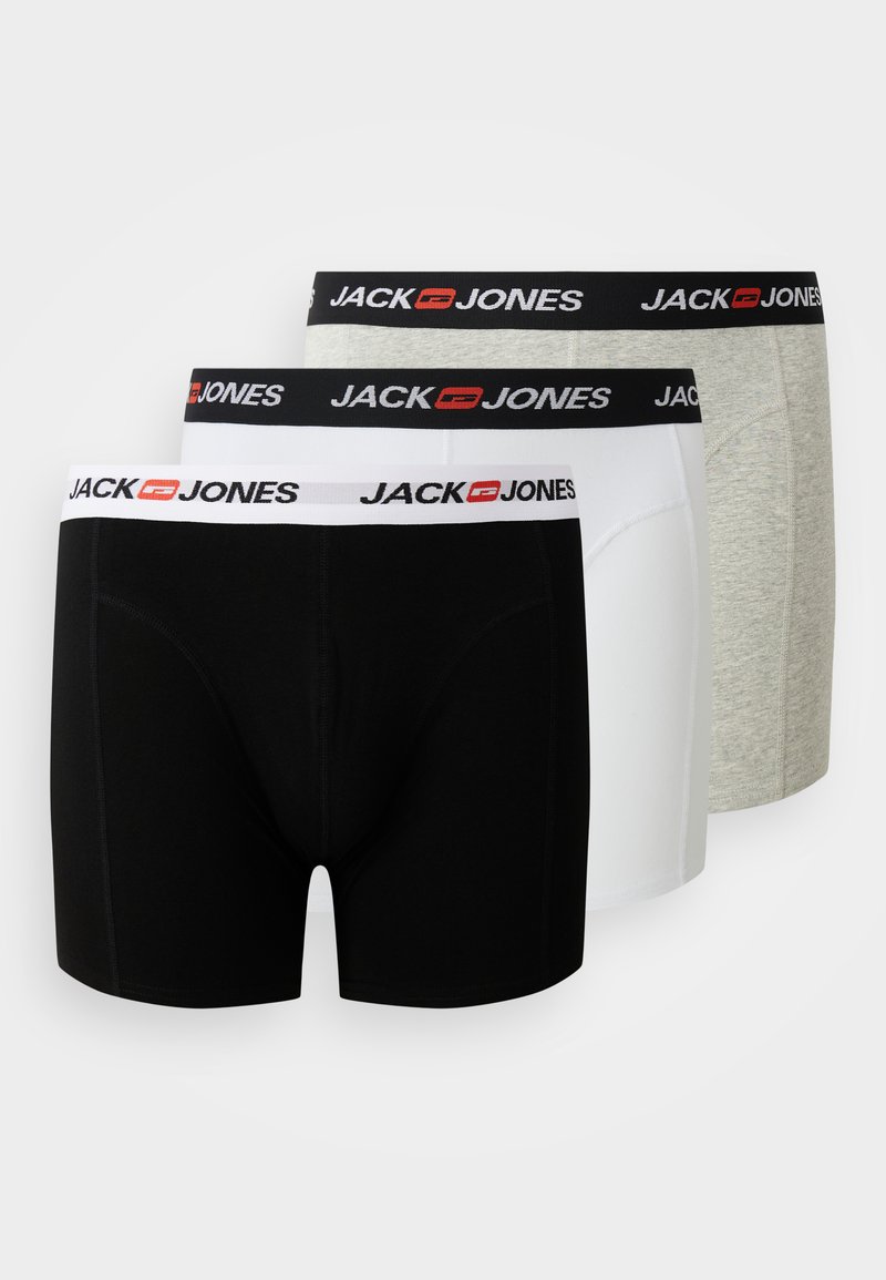 Drei Paare Boxershorts in Schwarz, Weiß und Grau. Jedes hat einen elastischen Bund mit dem Markennamen "JACK & JONES". Glatter Stoff, enganliegendes Design.