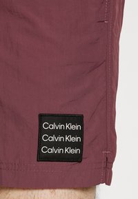 Calvin Klein Swimwear Calções de banho - dark raisin