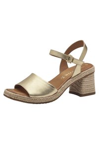 Gold metallic leather sandal with open toe, ankle strap, and a textured woven heel. Smooth finish and light tan insole with stitching detail.