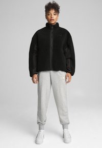 Puma REVERSIBLE - Chaqueta de invierno - black