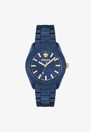 Námořnicky modré hodinky Versace s texturovaným ciferníkem, zlacenými akcenty, hodinovými značkami a vzorovaným náramkem s motivem řeckého klíče.