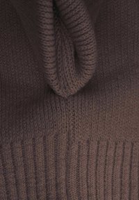 Brown knitted sweater featuring a ribbed texture, with a cozy, soft appearance and a thick fold at the neckline.