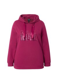 Fuchsiová mikina s kapucí a flitrovým nápisem "ROCK", detaily na šňůrkách, dlouhé rukávy a volný střih. Hladká látka s žebrovanými manžetami.