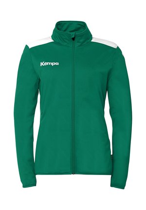 Groene jas met een hoge kraag, witte schouderaccenten, volledige rits en het "Kempa"-logo op de linkerkant van de borst. Glad textuur.