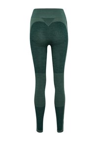 Gröna leggings med hög midja, med strukturerade detaljer och sömlös design. Materialet verkar mjukt och stretchigt.