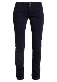 Černé skinny džíny s dvoubarevným pasem, předními kapsami a poutky na opasek, zobrazené zepředu na bílém pozadí.