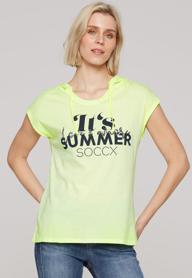 Light yellow T-shirt with hood, short sleeves, and printed text reading "It's Summer SOCXC." Soft fabric with a relaxed fit.