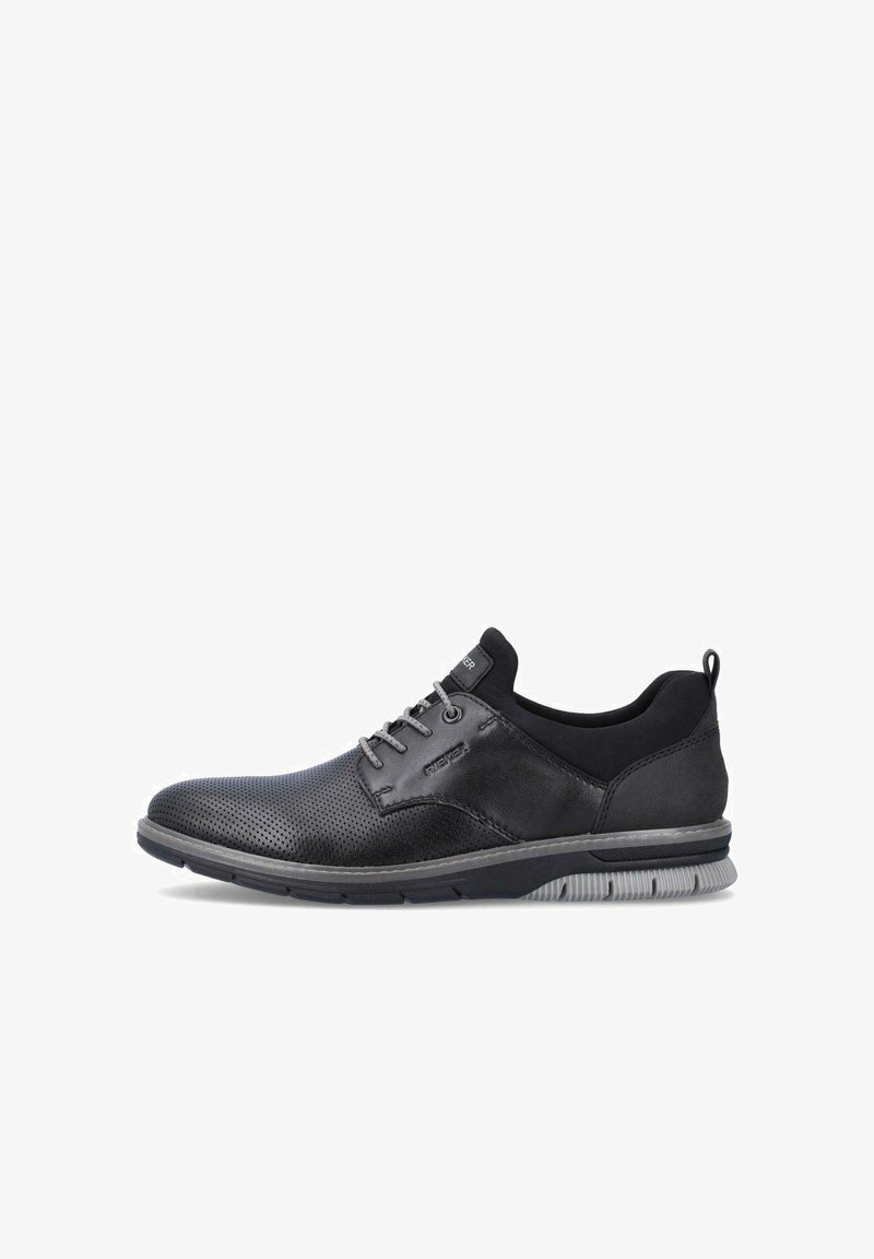 Black footwear featuring a combination of smooth and perforated leather. Rounded toe, lace-up design, and gray rubber sole.