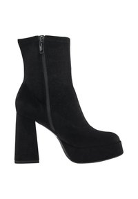 Bottes noires à talons hauts en suède, dotées d'une fermeture éclair latérale, d'une plateforme épaisse et d'un talon carré pour plus de hauteur.