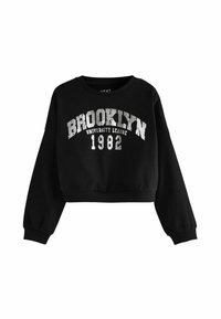 Sweatshirt noir court à manches longues. Présente un texte blanc usé : "BROOKLYN UNIVERSITY LEAGUE 1982" sur la poitrine. Matière douce.