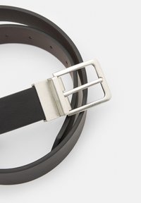 Black leather belt with a silver metal rectangular buckle. The belt is smooth with multiple holes for adjustment and a refined finish.