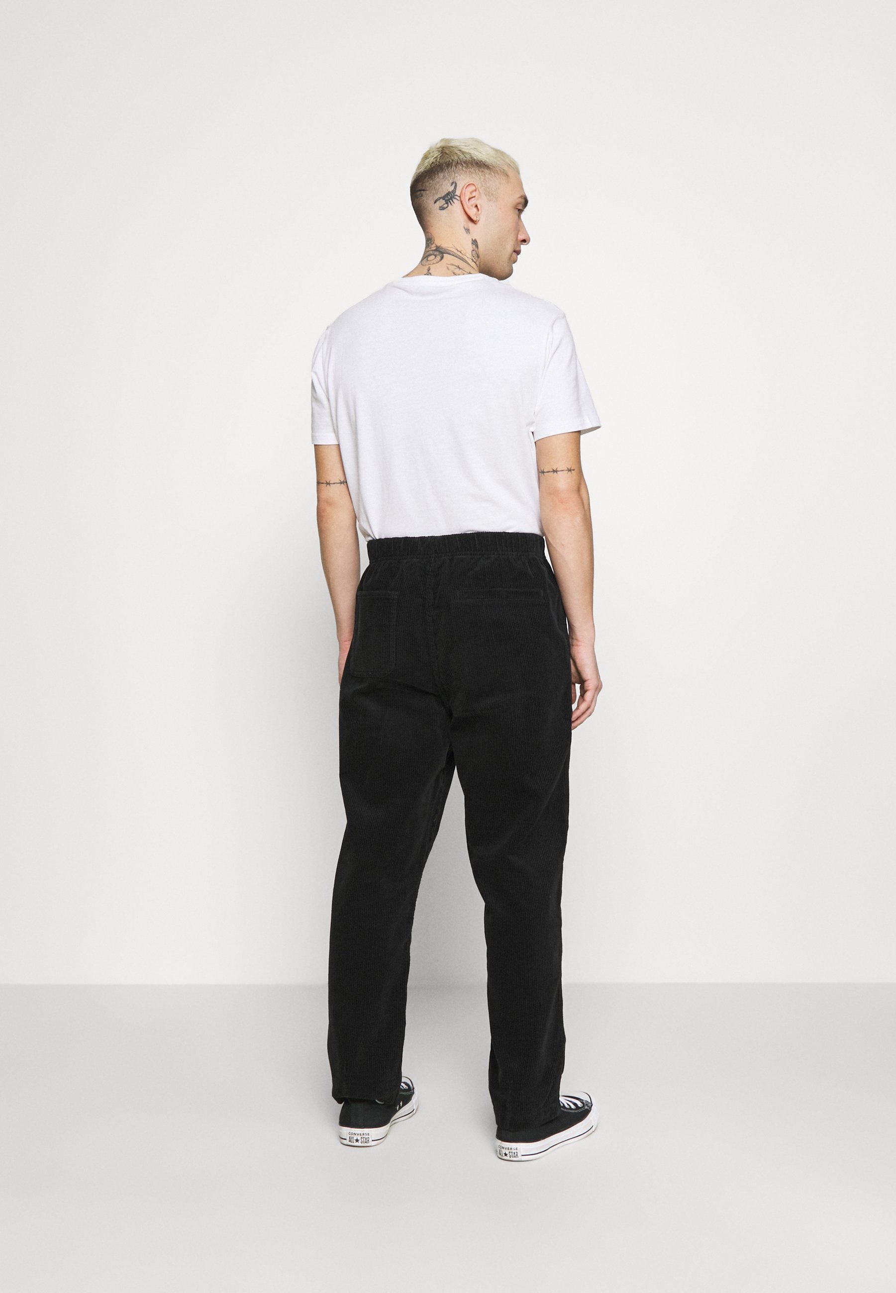 Converse TRAIL PANT - Trousers - black 