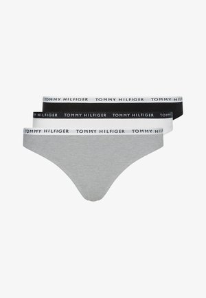 Soutien-gorge de sport Tommy Hilfiger en blanc avec un motif de logo rouge et bleu, associé à un string en coton gris doté d'une taille élastique avec logo blanc.