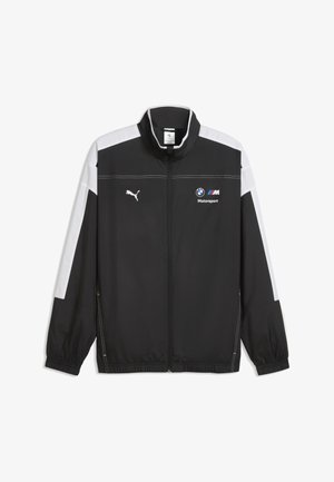 Czarna i biała kurtka na zamek z długim rękawem z logo Puma na lewej piersi oraz logo BMW Motorsport na prawej piersi.