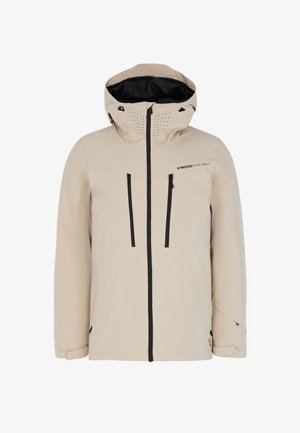 Chaqueta impermeable beige con capucha, acentos negros, bolsillos con cremallera y orificios de ventilación. Presenta un logo en el frente y puños ajustables.