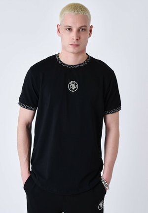À DÉTAILS LABYRINTHE - Print T-shirt - noir