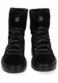 Black high-top boots made of suede with faux fur lining. Features metallic laces, circular eyelets, and a textured rubber sole.