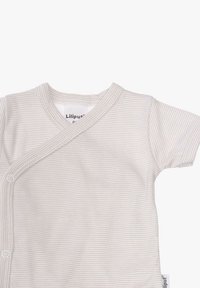 Short-sleeve wrap bodysuit in light beige with thin white stripes, made of soft cotton, featuring snap buttons and a V-neck collar.