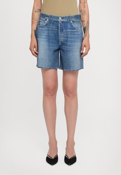 Denim shorts in light blue, made of soft cotton. Features a high waist, frayed hem, and five-pocket design with silver hardware accents.