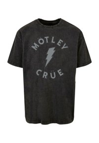 Must või särk, millel on ümar kaelus, hall välku kujutav disain ja "MÖTLEY CRÜE" tekst ringikujulises paigutuses. Lühikesed varrukad.