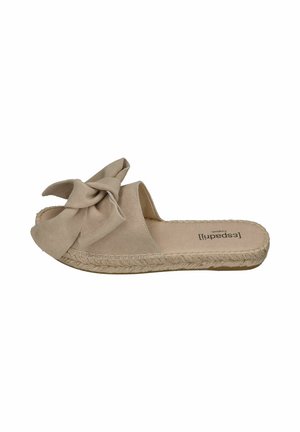 Beige suede espadrille slide with large bow detail on upper and braided jute sole.
