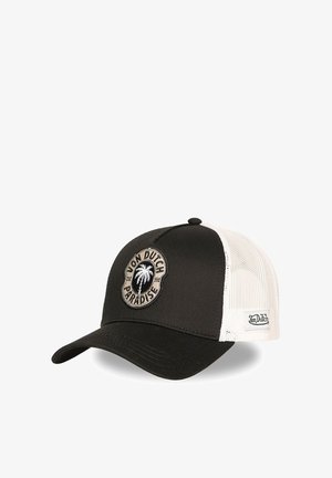 Black and white Von Dutch trucker cap with mesh back and front patch showing palm tree and "Von Dutch Paradise" text.