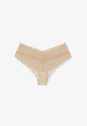 Ropa interior de encaje beige con estampado de leopardo, bordes en forma de onda y un frente en forma de V sobre un fondo blanco.