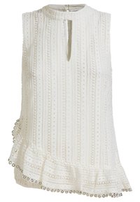 Top sin mangas blanco con cuello alto, que presenta una tela texturizada, rayas verticales, una abertura en forma de ojal y acentos de cuentas plateadas a lo largo del dobladillo.