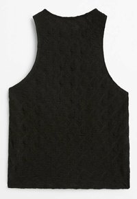 Haut noir sans manches en tissu texturé et à motifs, étalé à plat, montrant le dos sur un fond blanc.