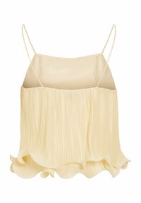 Haut caraco plissé beige clair avec fines bretelles spaghetti et ourlet ondulé à volants.