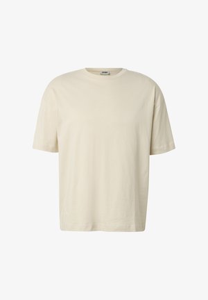 Beige T-skjorte med korte ermer, rund hals og normal passform, med en liten merkelapp på innsiden av halsen.