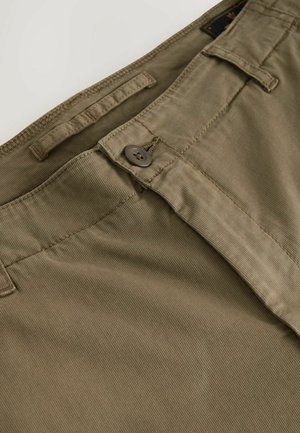 Khaki trousers with a smooth texture, featuring a button closure, belt loops, and subtle horizontal ribbing on the fabric.
