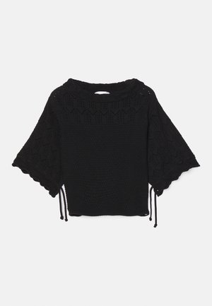 Haut noir en tricot à manches courtes présentant un motif texturé, des manches à volants et des détails de cordon de serrage à l'ourlet.