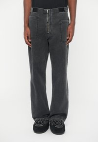 Aries UNISEX - Calças de ganga largas - black