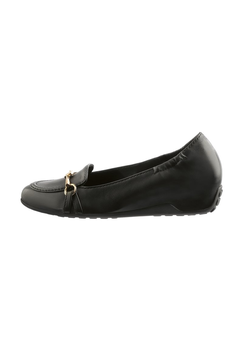 Black leather flat shoe with a rounded toe, decorative gold hardware, and a flexible rubber sole. Features a smooth texture and slip-on design.