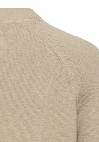 Beige sweater fabric with a soft texture, featuring a subtle knit pattern and a round neckline. The seams are neatly finished.