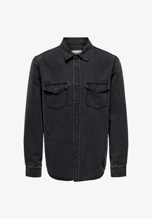 Black denim shirt with a button-down collar, front snap pockets, long sleeves, and a straight hem. Features double-stitched seams.