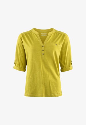 Limonengrünes, leichtes Langarmshirt mit V-Ausschnitt und drei Knöpfen, ausgestattet mit einer linken Brusttasche und hochgekrempelten Bündchen.