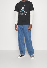 Jordan Triko s potiskem - black