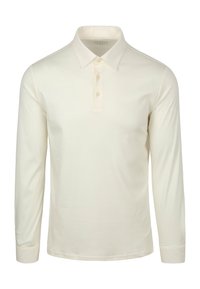 Langermige polo in crèmekleurige katoen met een klassieke kraag, een drieknoopsluiting en rechte manchetten. Soepele textuur, minimale accenten.