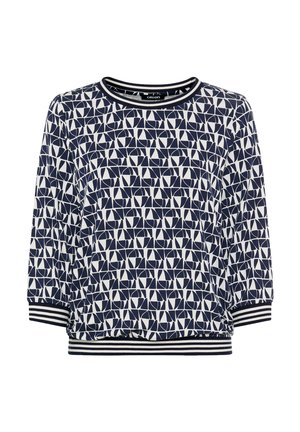 Navy and white geometric patterned long-sleeve shirt with striped cuffs and hem, crew neckline, and relaxed fit.